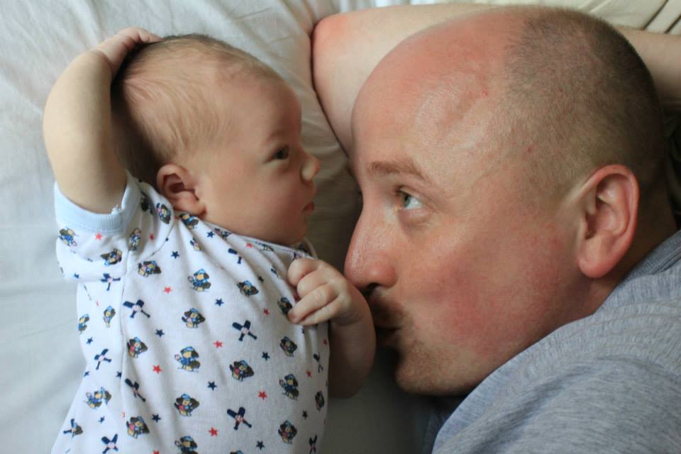 A father nose-to-nose with his baby